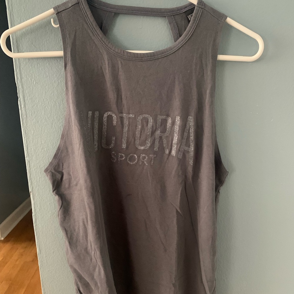 Open back workout top by Victoria sport. Size extra small. Super comfortable.